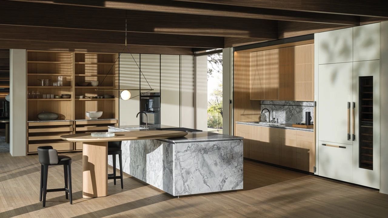 Wood and marble island with breakfast table — Design Avenue showroom