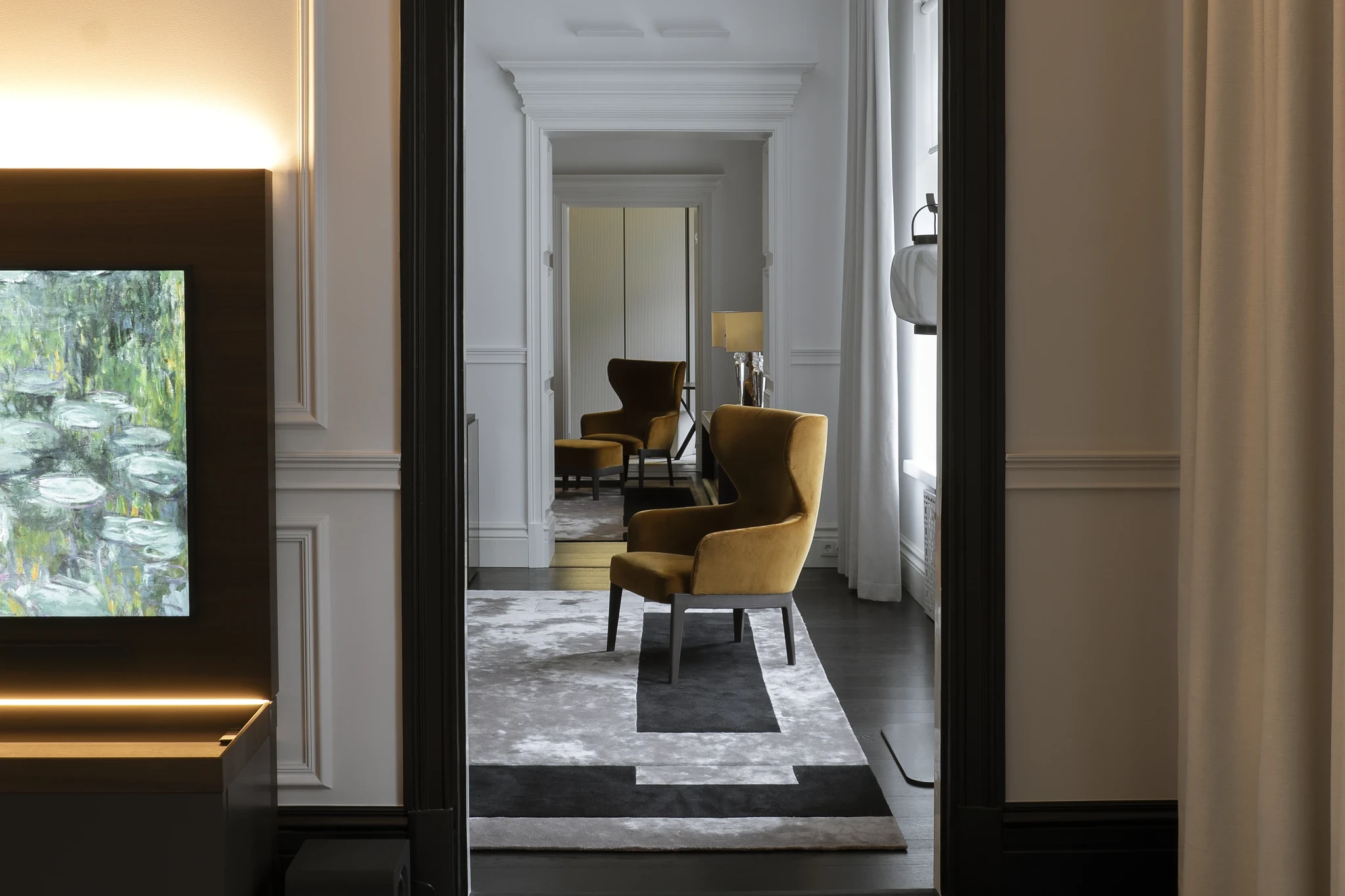 Through the doorway, into the next room
