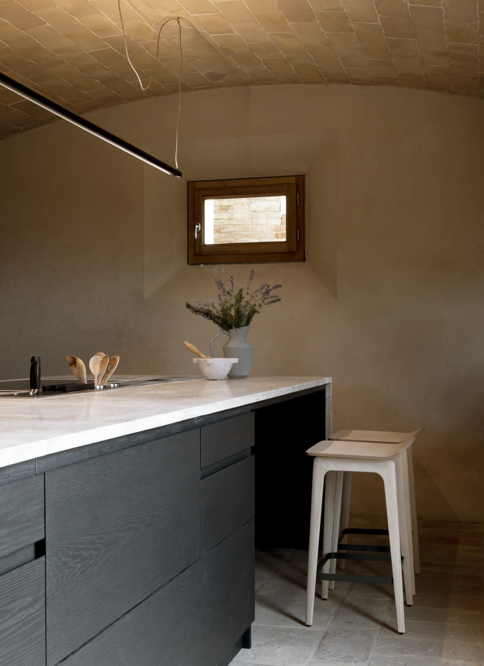 A Woody stool at the kitchen island