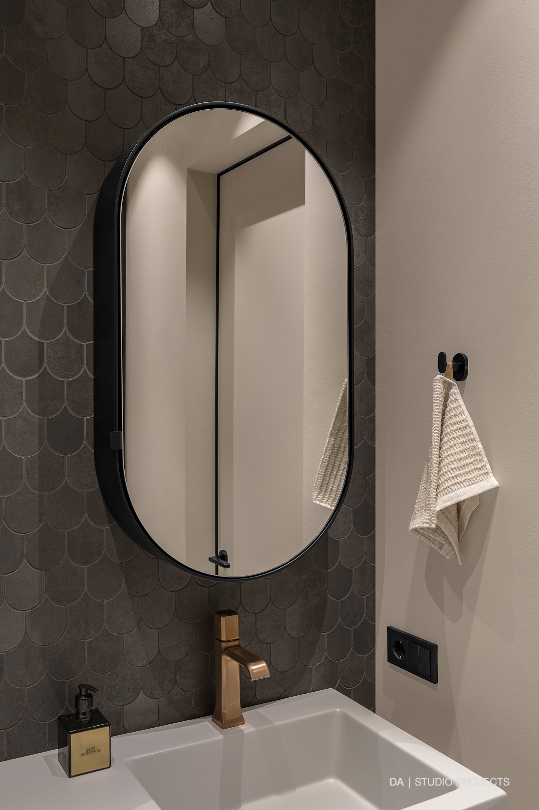 Guest bathroom with oval mirror