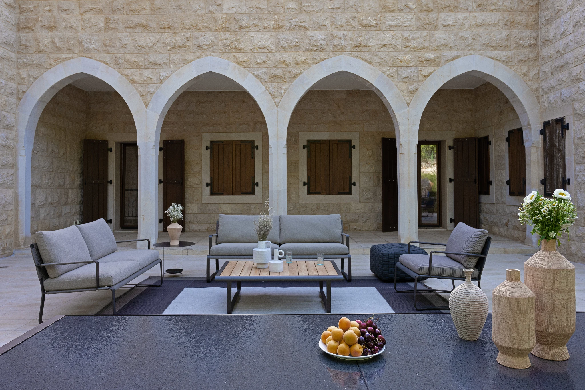 The arcaded courtyard, furnished with the Phoenix line