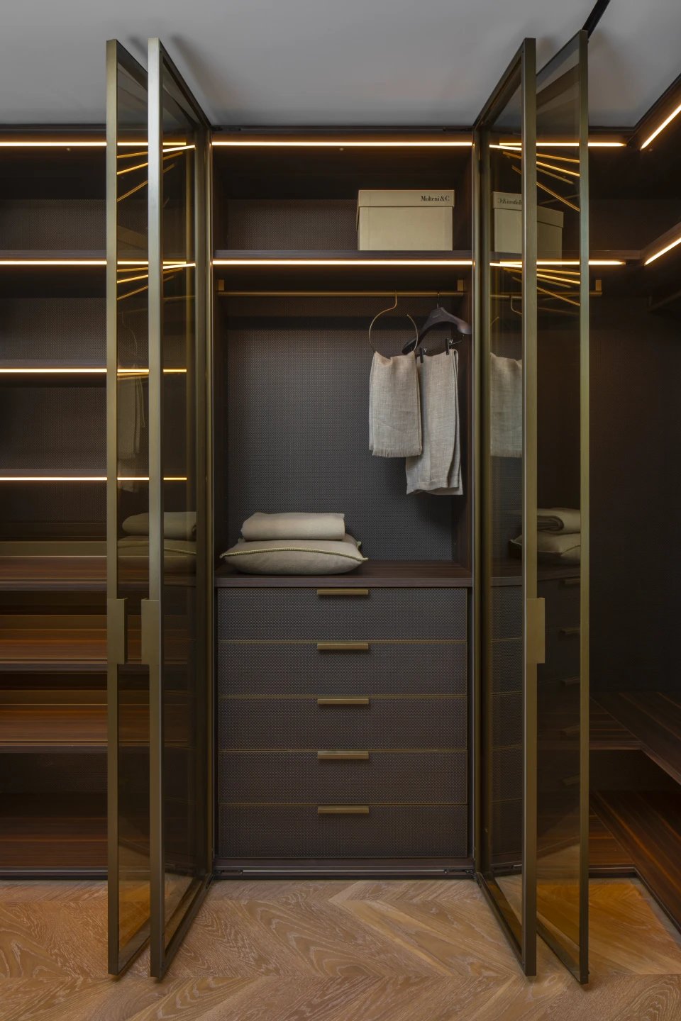 Closet detail — larix wood, piqué drawers, bronze fittings