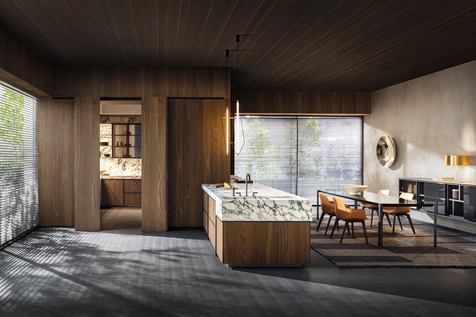Timber kitchen island beside the dining area — Design Avenue showroom